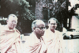 Three Swamis in gerua, Swami Swahananda to far right, outside Berkeley Center