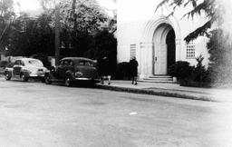 Street view of entrance to the Berkeley Center, unkown women walking, b&w