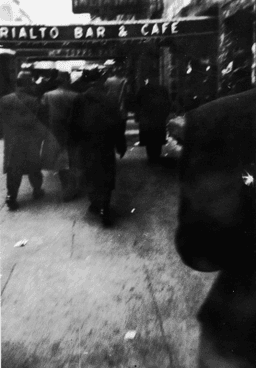 Swamis on the street outside the Westside New York Center, Swami Bodhananda among them (arrow)